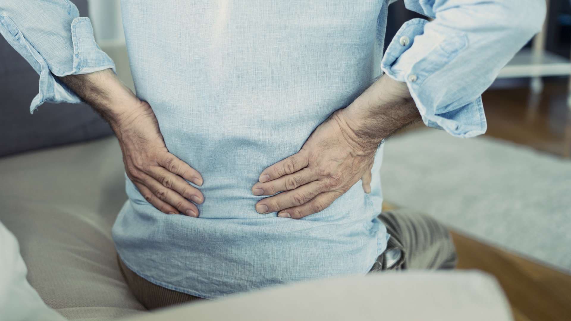 Old man with back pain