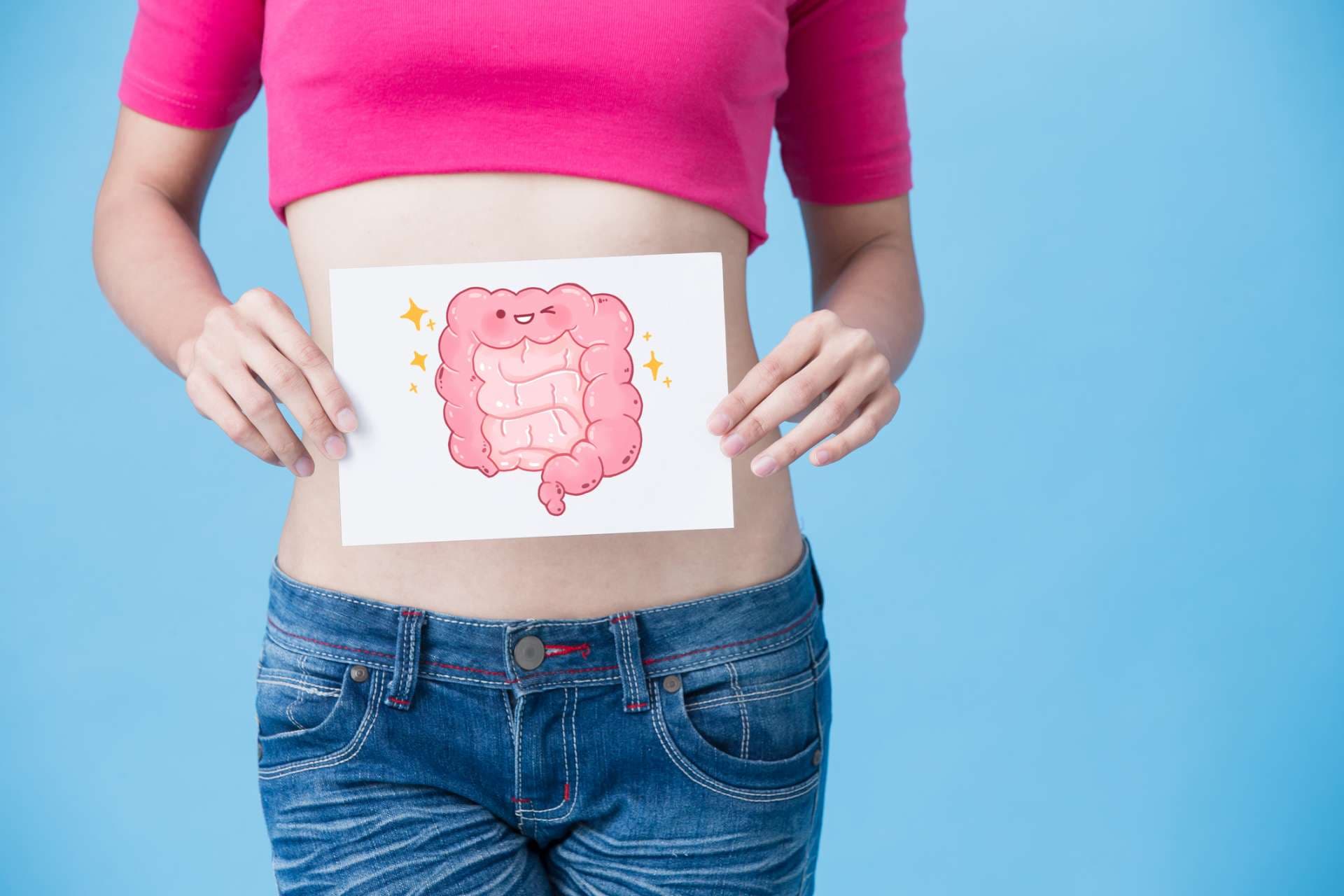 woman with health intestine concept on the blue background