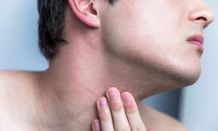 young man checking his facial skin. men's skincare concept.