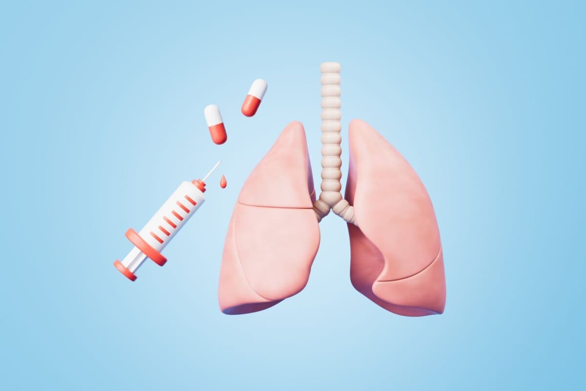3D-Rendering medizinische Lungenkapsel und Spritze auf blauem Hintergrund