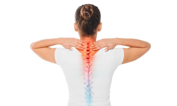 Pain in the spine. female back with backache, pain at cervical spine