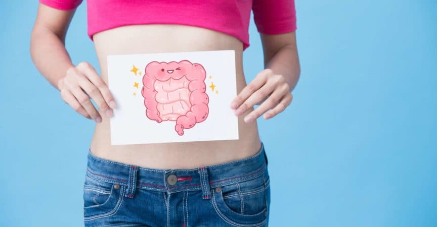 woman with health intestine concept on the blue background