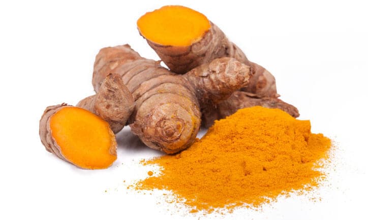 Studio shot on white background with natural reflections of fresh and dried turmeric. (cúrcuma Longa) kurkum