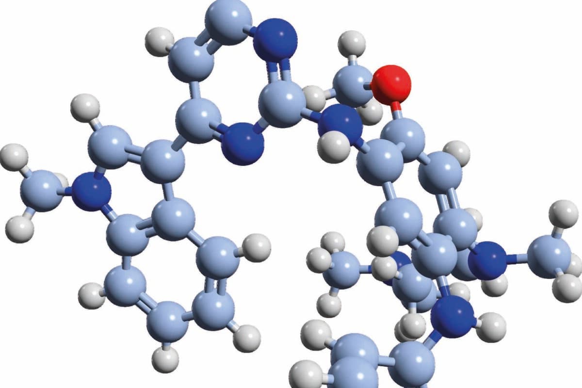 Osimertinib lung cancer drug molecule. Computer model showing the structure of a molecule of the epidermal growth factor receptor (EGFR) tyrosine kinase inhibitor (TKI) osimertinib,which is used to treat advanced non-small-cell lung carcinoma (NSCLC,cancer). Atoms are colour-coded: carbon (light blue),hydrogen (white),oxygen (red),nitrogen (dark blue)