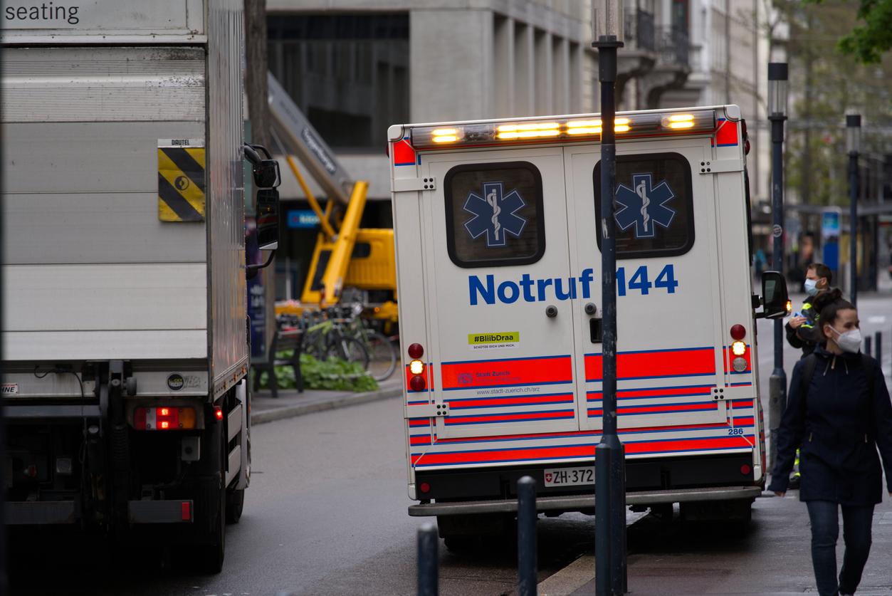 Ambulance parked on pavement at City of Zurich. Photo taken April 7th, 2021, Zurich, Switzerland.