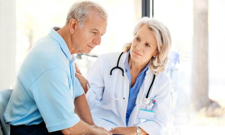 Sad patient being recomforted by a doctorhttp://bit.ly/1fTZld6