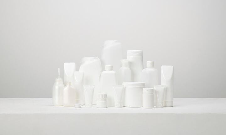 Group of white plastic packaging still life