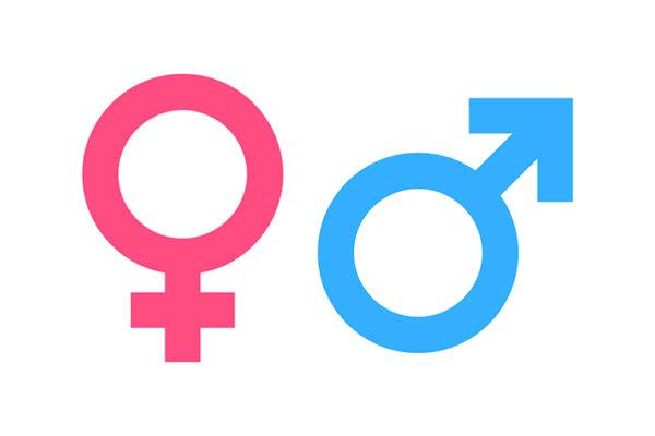 Geschlechtersymbole in Pink und Blau.